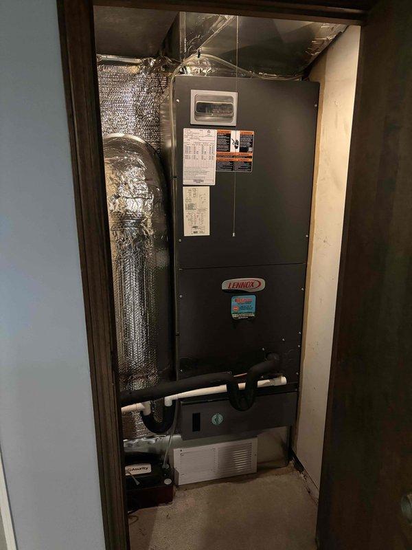 Completed annual second visit Platinum Level maintenance on one-year-old Lennox HVAC system. Performed comprehensive inspection and service including filter replacement with 20x20x5 filter, verified system operation at 53°F supply temperature, inspected ductwork and connections, and documented equipment condition with photos showing proper installation and functionality of all components.