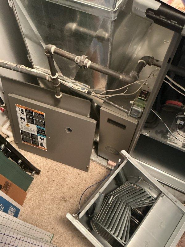 Conducted comprehensive HVAC system replacement estimate for residential property featuring existing Lennox outdoor condensing unit and indoor furnace with evaporator coil located in basement utility area. Evaluated current equipment condition, measured existing installation specifications, documented system configuration including ductwork layout and electrical connections, photographed exterior condensing unit positioned on concrete pad with proper clearances and interior furnace assembly with associated refrigerant lines and gas piping. Provided homeowner with replacement options and system sizing recommendations based on home's heating and cooling requirements.