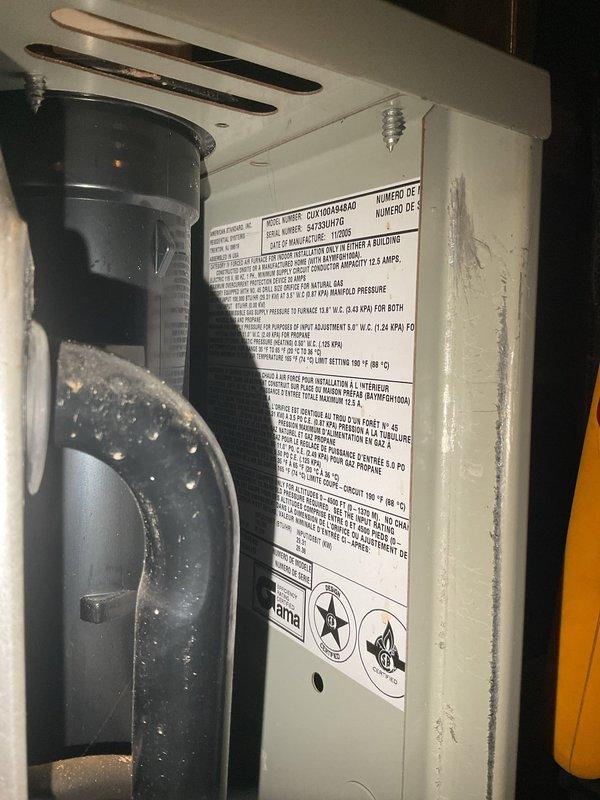 Responded to no cooling complaint on 5-year-old residential air conditioning system. Upon arrival, confirmed unit was running but not producing cold air with no visible ice buildup on indoor coil. Performed diagnostic inspection of both indoor air handler and outdoor condensing unit, examining electrical control board, relay connections, and wiring terminals. Inspected capacitors, contactors, and control circuitry for proper operation. Documented system components and electrical panel configuration for service records.
