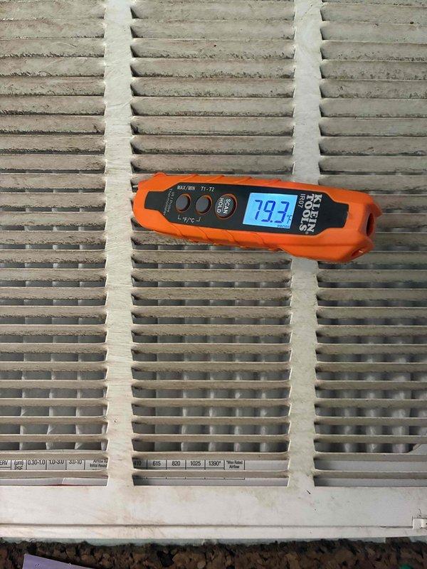 Completed routine AC tune-up and maintenance inspection per scheduled campaign. Performed system diagnostics using digital multimeter to verify electrical parameters and measured supply air temperature at 19.3 degrees, confirming proper cooling performance. Inspected air filtration system and documented filter condition during service visit.