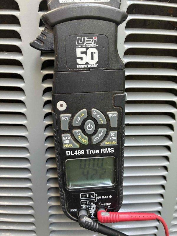 Completed scheduled HVAC maintenance tune-up on residential system. Performed comprehensive electrical diagnostics using digital clamp meter to verify proper amperage draw and system performance. All electrical connections inspected, measurements recorded within normal operating parameters, and unit confirmed to be functioning efficiently.