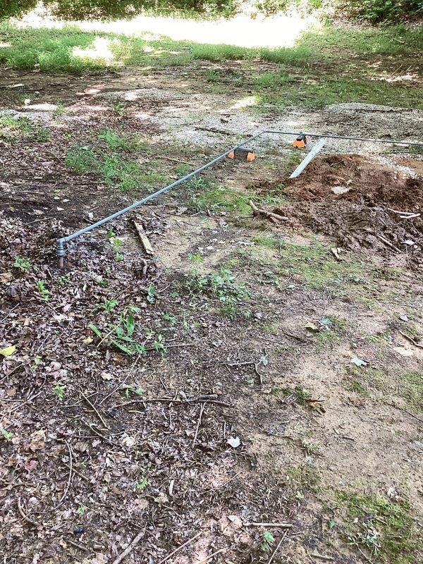 Completed gas supply line installation for appliance connection. Installed and secured gas piping from exterior ground-level supply point through interior ceiling rough-in, terminating with properly positioned shut-off valves and connection points ready for appliance hookup. All supply lines tested and verified for proper placement and code compliance.