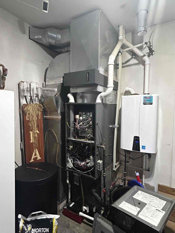 Completed annual Platinum Level maintenance on dual HVAC system in residential property with both units approximately 7 years old. Performed comprehensive inspection and servicing of outdoor condensing units, including electrical panel examination, capacitor testing, and verification of all electrical connections and components. Inspected condensate pump assembly and drainage lines at exterior location. Interior maintenance included thorough inspection of furnace system, internal wiring verification, and examination of all ductwork connections. Replaced both 16x25x2 air filters as part of routine maintenance protocol. All systems tested and operating within normal parameters upon completion.