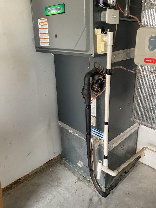 Responded to no cooling complaint on system under warranty. Diagnosed failed evaporator coil and thermostatic expansion valve (TXV) on air handler unit. Documented equipment model and serial numbers, photographed affected components, and submitted warranty claim for replacement evaporator coil and external bolt-on TXV with estimated 4-hour installation time upon part arrival.