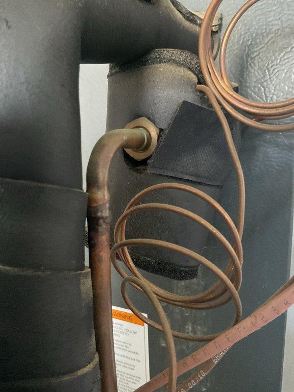 Responded to no cooling complaint on system under warranty. Diagnosed failed evaporator coil and thermostatic expansion valve (TXV) on air handler unit. Documented equipment model and serial numbers, photographed affected components, and submitted warranty claim for replacement evaporator coil and external bolt-on TXV with estimated 4-hour installation time upon part arrival.