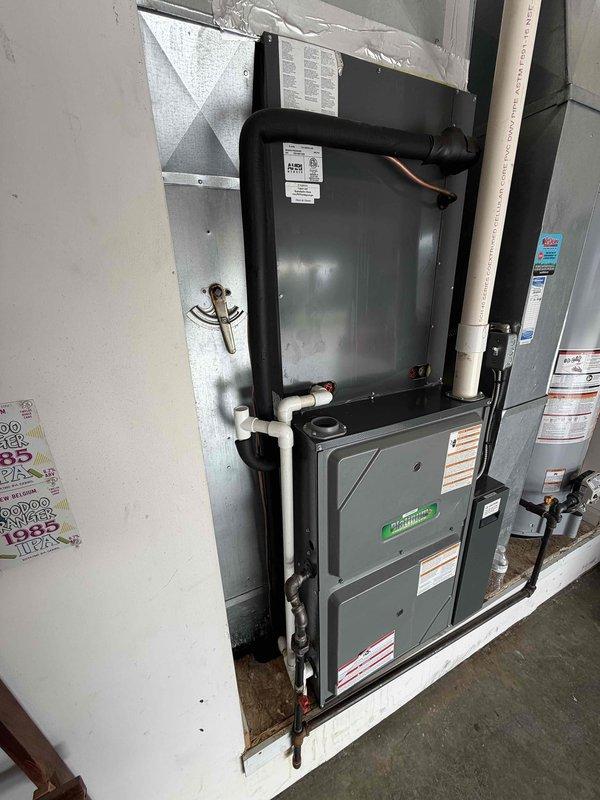 Responded to water leak issue at residential HVAC system and diagnosed failed coil drain pan requiring replacement. Documented equipment model and serial number information, photographed damaged pan and system configuration for warranty part ordering. Determined repair will require two technicians to attempt pan replacement without opening refrigerant system, with completion time dependent on accessibility of coil pan assembly.