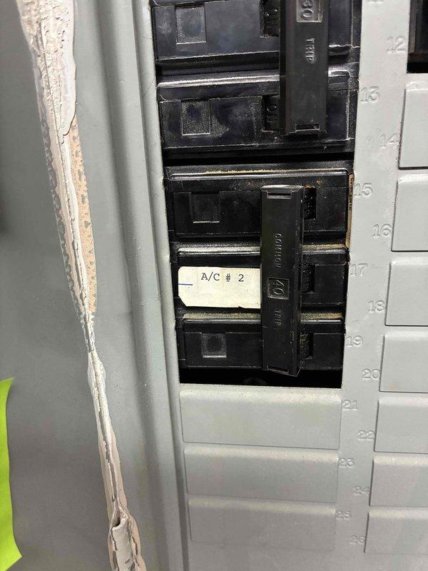 Responded to no cooling complaint on 1-year-old system in main building. Upon arrival, confirmed airflow present at supply registers but no cooling output. Inspected electrical panel and verified proper power supply to AC unit #2 circuit breaker. Performed system diagnostics to identify cause of cooling failure and completed necessary repairs to restore proper operation. System tested and verified cooling functionality upon completion.