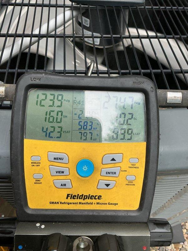 Completed warranty callback to diagnose HVAC system issue. Performed diagnostic testing using refrigerant manifold and micron gauge, recording system pressures, temperatures, superheat, and subcooling values. Identified faulty high pressure switch preventing system operation. Documented model and serial number information, photographed failed component, and submitted part order request for replacement high pressure switch with estimated 2-hour installation time upon arrival.