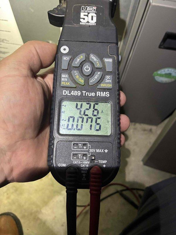 # HVAC Maintenance Summary

Completed scheduled AC tune-up maintenance on residential air conditioning system. Performed comprehensive system inspection including electrical diagnostics with digital multimeter to verify proper voltage and amperage readings, inspected gas line connections and flexible connector for proper installation and safety, and documented equipment condition through photographic records. All components found operating within normal parameters with no immediate service needs identified.