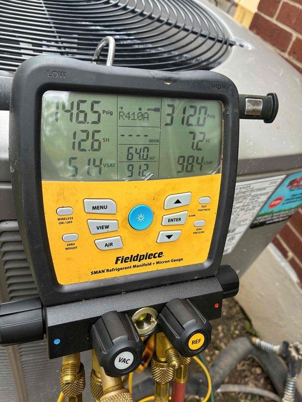 Responded to service call for 7-month-old system requiring repeated hard resets to operate. Performed comprehensive diagnostic testing using refrigerant manifold gauge, confirming R410a system pressures at 246.5 psig suction and 312.0 psig discharge with superheat reading of 12.6°F and subcooling of 7.2°F. Measured supply air temperature at 63.5°F using digital thermometer. System operating parameters indicate proper refrigerant charge and airflow, suggesting intermittent electrical or control board issue causing lockout condition that requires manual reset to restore operation.