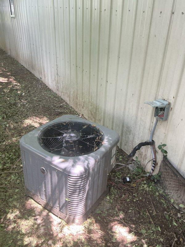 Responded to no-cooling service call for recently purchased home. Upon arrival, conducted thorough assessment of wall-mounted air handler unit and outdoor condenser unit. Confirmed system was not operational due to incomplete installation by previous owners. Evaluated electrical connections, refrigerant line sets, condensate drainage, and control wiring between indoor and outdoor units. Documented existing equipment configuration including ductwork connections and electrical disconnect. Provided homeowner with detailed assessment of required work to properly connect and commission the HVAC system for operational status.