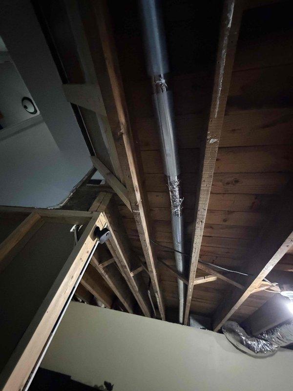 Completed installation of a 2.5-ton, 13 SEER air conditioning system with matching evaporator coil. The new condensing unit was positioned and connected to the indoor coil assembly, with refrigerant lines routed through the attic space and properly secured to structural framing. All electrical connections, condensate drainage, and system controls were installed per manufacturer specifications, and the system was tested for proper operation.