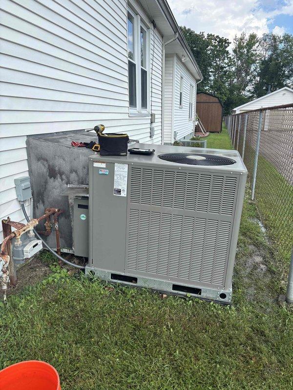Completed annual planned maintenance on 9-month-old packaged HVAC unit during second visit as requested near end of day. Performed comprehensive system inspection with access panel removed, tested electrical components including amperage readings at 39.13 amps using digital multimeter, verified proper operation of motor and capacitor, inspected refrigerant lines and connections, and replaced 20x20x5 air filter per maintenance schedule.