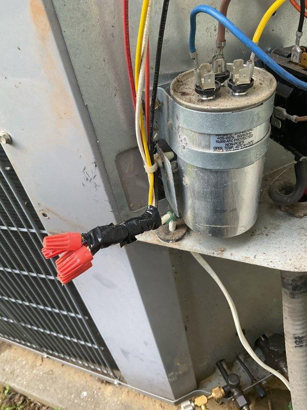 Responded to callback for downstairs HVAC unit with complete loss of power, previously serviced on 6/23. Upon arrival, confirmed upstairs unit operational and no electrical service interruptions or tripped breakers. Inspected downstairs unit and identified failed capacitor preventing system startup. Removed defective capacitor and installed new replacement unit with proper MFD rating and voltage specifications. Verified all electrical connections secure with wire nuts and proper color-coded wiring intact. Tested system operation and confirmed unit restored to full functionality with proper amperage draw and normal operating temperatures.