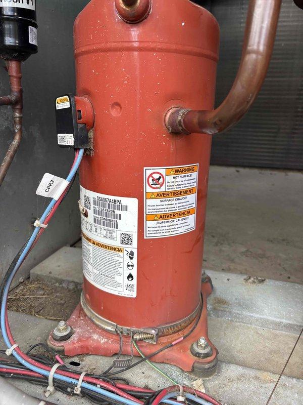 Replaced failed compressor on aging HVAC system to restore cooling operation. Installed new compressor unit from shop inventory, reconnected refrigerant lines with proper fittings, and verified all electrical connections were secure. System tested and confirmed operational with proper cooling performance restored.