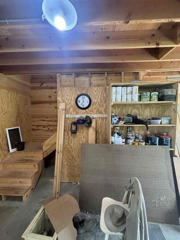 Conducted on-site assessment of detached workshop building for mini split installation estimate. Evaluated interior space dimensions, electrical requirements, and optimal placement for indoor unit based on workspace layout and existing ceiling structure. Documented current conditions including exposed beam construction, available wall space, and concrete flooring for equipment positioning recommendations.