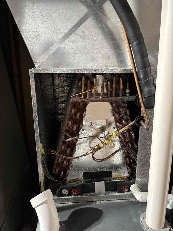 # HVAC Maintenance - Planned Single Maintenance

Performed first preventative maintenance visit on a 3-year-old HVAC system. Replaced 20x25x5 air filter and conducted standard system inspection. Recorded supply air temperature at 58°F using calibrated digital thermometer. Inspected evaporator coil assembly through access panel, noting copper tubes showing age-appropriate oxidation and patina formation consistent with normal operation. Verified all refrigerant lines, drain lines, and control components are secure and functioning. System operating within normal parameters for age and usage.