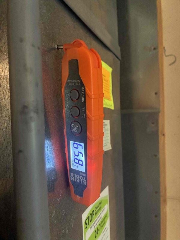 Responded to no cooling complaint on residential HVAC system less than 10 years old. Upon arrival, confirmed system was cycling but maintaining inadequate temperature approximately 5 degrees above setpoint with airflow present but not cooling properly. Performed diagnostic testing and measured refrigerant subcooling at 9.4 degrees and supply air temperature at 65.8 degrees, indicating insufficient cooling capacity. System evaluation revealed performance issues requiring further assessment of refrigerant charge levels and cooling circuit operation to restore proper cooling function.