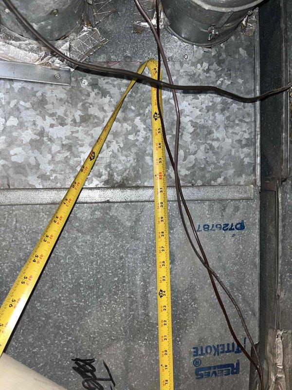 Conducted comprehensive replacement estimate for non-operational HVAC system at residential property. Performed detailed measurements of existing air handler unit, documented current equipment condition including refrigerant lines and electrical components, and assessed thermostat functionality showing 67-degree reading on Emerson digital control. Provided homeowner with complete system replacement options and recommendations based on equipment age, visible wear patterns, and operational failure.