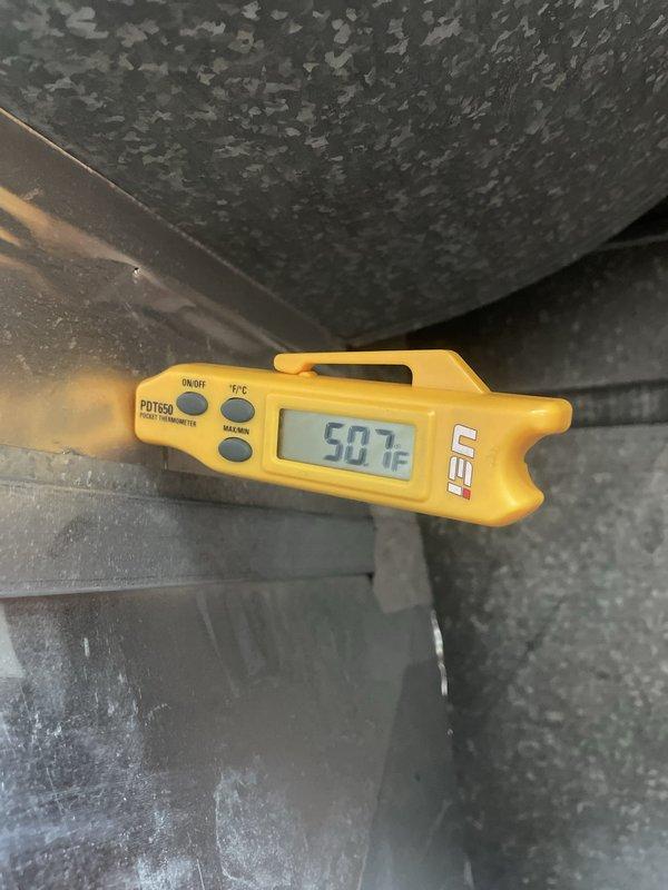 Responded to callback for condensation issue on recently installed furnace system. Upon arrival, verified unit was operational for both heating and cooling functions. Conducted temperature diagnostics using digital thermometer at multiple points on ductwork and air handling components, recording supply air temperatures of 58.7°F and 50.7°F at different locations. Inspected condensate drainage system, drain lines, and trap assembly for proper installation and function. System remains functional pending customer's rescheduled appointment for further evaluation and resolution of condensation concern.