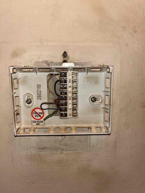 Conducted comprehensive HVAC replacement estimate for residential property with non-functional air conditioning system and aging, poorly operating furnace. Evaluated existing low-voltage thermostat wiring and connections, assessed main electrical panel capacity and breaker configuration to determine compatibility for new equipment installation. Documented current system conditions including extended reliance on window units for cooling, photographed electrical infrastructure and control components, and provided homeowner with complete replacement options for both heating and cooling systems.