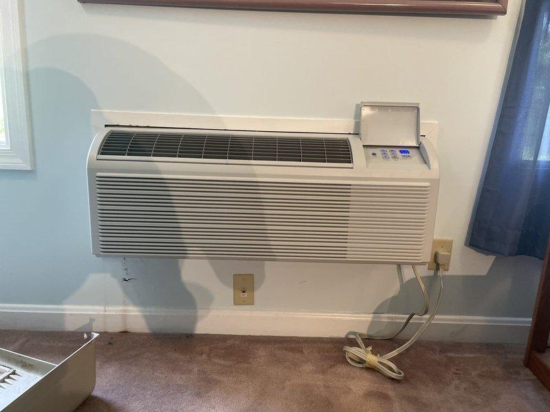 Completed replacement of existing PTAC unit with new 15,000 BTU wall-mounted system. Installed unit in existing wall sleeve, verified proper electrical connections, and tested all operational functions including cooling cycle, thermostat controls, and airflow distribution to ensure system performance meets manufacturer specifications.
