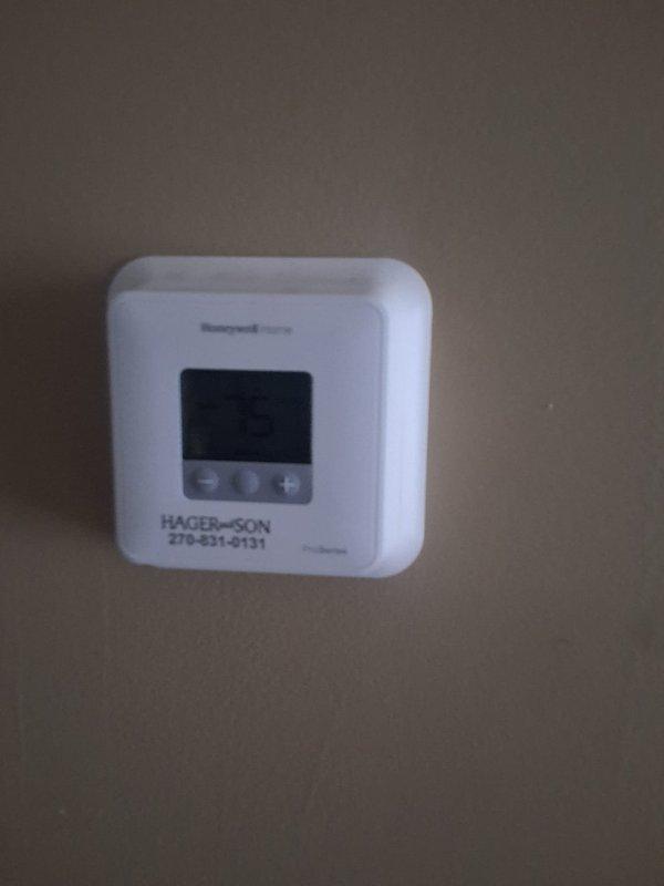 Responded to no cooling call on 5-year-old residential HVAC system that would not power on. Upon arrival, diagnosed and resolved thermostat issue at Honeywell Home unit. System was successfully restored to operational status with proper airflow and cooling performance. Post-repair diagnostics confirmed R-410A refrigerant system operating within manufacturer specifications: return air at 78.3°F dry bulb with 60.6% relative humidity, supply air at 58.4°F producing 19.9°F temperature split, suction pressure at 142.6 PSIG with proper superheat, and liquid line pressure at 317.2 PSIG with adequate subcooling. System tested and left in full cooling operation with tenant satisfied.
