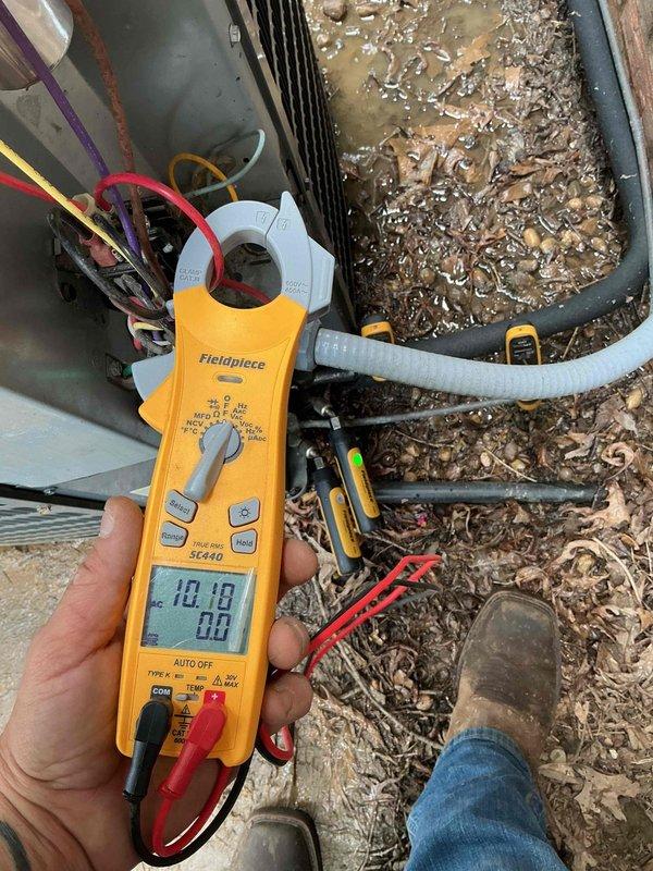 Completed dismissed visit on 7-year-old single-system residential HVAC unit with 16x25 filter size. Performed diagnostic measurements using clamp meter on electrical components, inspected condensate drain pan and drainage system, and verified unit operation during second maintenance visit for system requiring service renewal.
