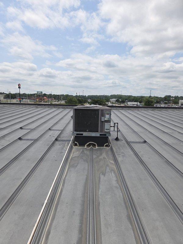 Completed follow-up service visit to commercial rooftop HVAC system to replace air filters in the correct unit as previously identified. Accessed rooftop package unit via ladder, installed new filters to manufacturer specifications, verified proper fit and airflow, and confirmed unit operation before departure.