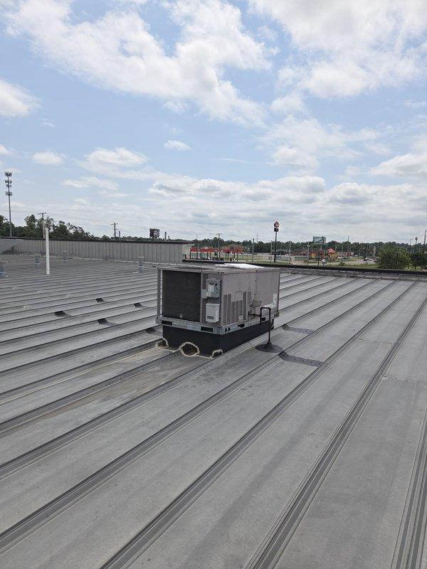 Completed follow-up service visit to commercial rooftop HVAC system to replace air filters in the correct unit as previously identified. Accessed rooftop package unit via ladder, installed new filters to manufacturer specifications, verified proper fit and airflow, and confirmed unit operation before departure.