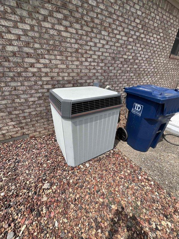 Conducted comprehensive HVAC system replacement estimate for residential property. Evaluated existing Weathertron thermostat control system and outdoor condenser unit positioned against exterior brick wall on decorative stone bed. Documented current equipment specifications, assessed system functionality, and provided recommendations for complete system replacement to improve energy efficiency and performance.