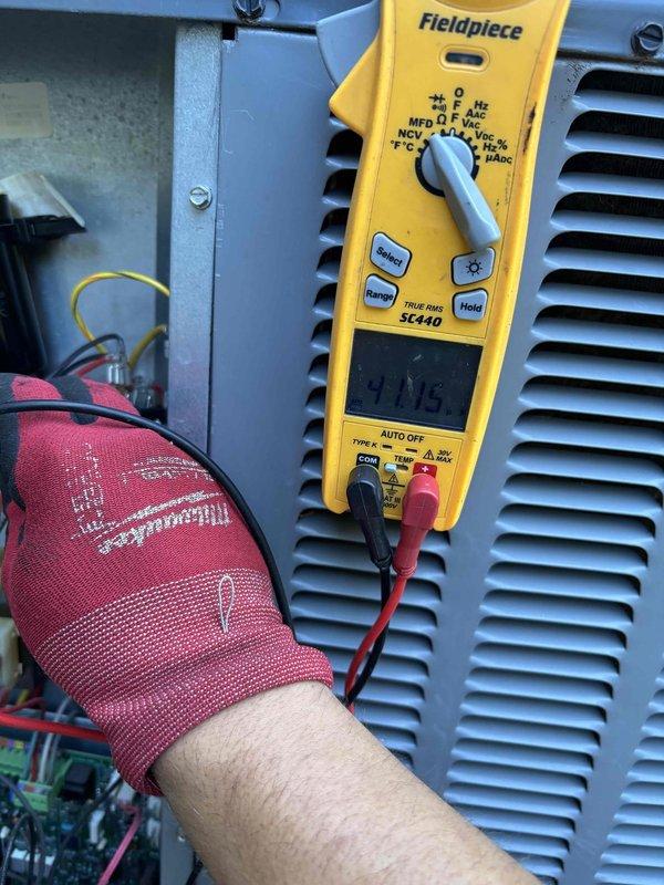 Completed annual Platinum Level maintenance on single HVAC system during first scheduled visit. Performed comprehensive diagnostic testing using calibrated digital meters to verify system performance parameters, including electrical measurements and temperature readings across the equipment. Inspected accessible components, checked critical operating specifications, and documented system conditions through detailed photographic records of testing procedures and ductwork assembly points.