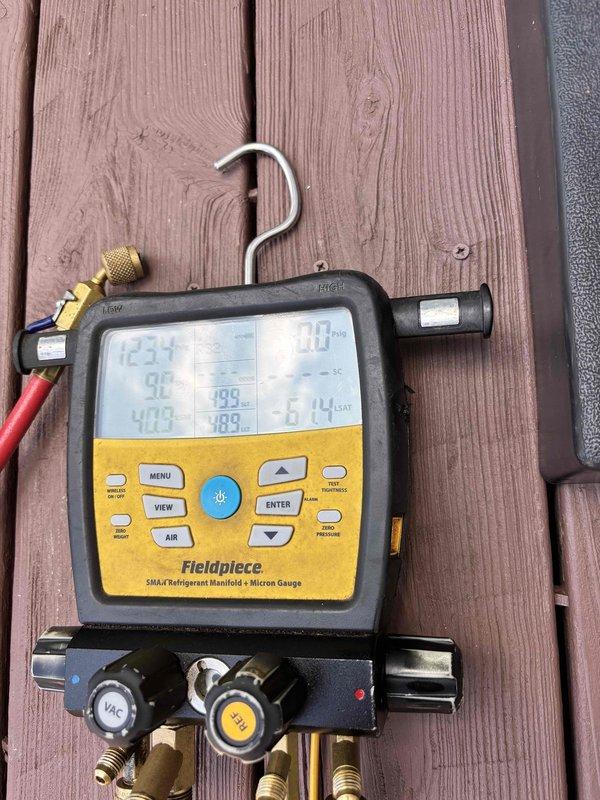 Responded to install callback for water leak and clicking noise on recently installed system. Upon arrival, assessed unit and confirmed low refrigerant charge as previously noted. Used digital manifold gauges and temperature probes to verify system pressures and operating temperatures. Scheduled follow-up leak search, repair, and proper refrigerant recharge to factory specifications per install team recommendation.