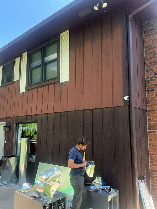Conducted comprehensive site evaluation for mini-split system installation at residential property. Assessed exterior and interior mounting locations, documented existing building structure including wood siding and brick exterior, evaluated electrical access points, and photographed proposed equipment placement areas to develop accurate system sizing and installation quote.