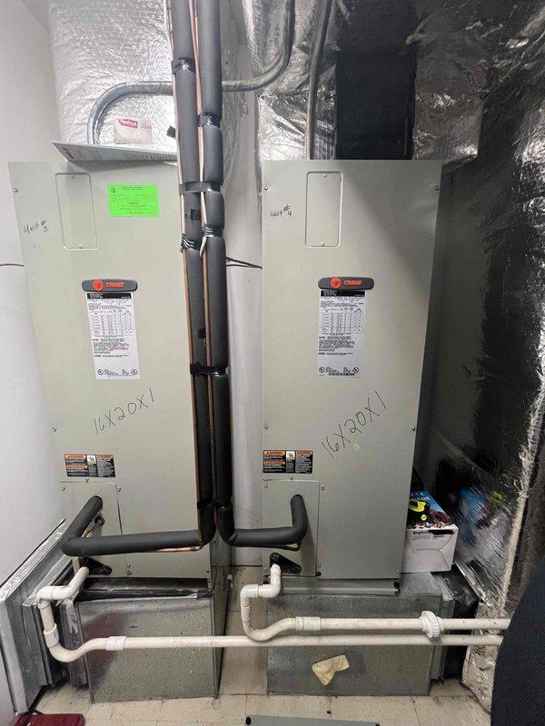 Conducted comprehensive replacement estimate for five aging split system HVAC units approximately 22 years old, including four 3-phase units and one single-phase unit. Assessed existing Trane air handler installations (Units 5 and 6 documented) in mechanical room with associated ductwork, drainage systems, and electrical infrastructure. Evaluated electrical panel configuration and power requirements to determine compatibility for new equipment installation and verified existing 3-phase and single-phase service capabilities for proper system replacement planning.