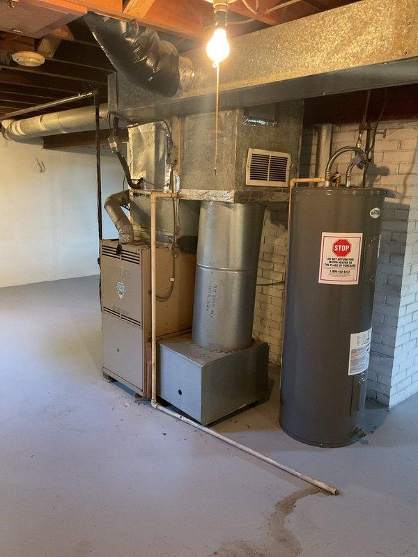 Completed one-time planned maintenance service on residential HVAC system at vacant property in preparation for sale. Performed comprehensive inspection of forced air furnace in basement mechanical room, including examination of heat exchanger, burner assembly, blower motor, and air filter replacement. Verified proper operation of thermostat controls, tested heating cycle, and confirmed system functionality with temperature set at 73°F. Inspected refrigerant lines, ductwork connections, and plenum components for proper sealing and condition. All equipment found to be in normal operating condition with no deficiencies noted. System left in proper working order and ready for property transfer.