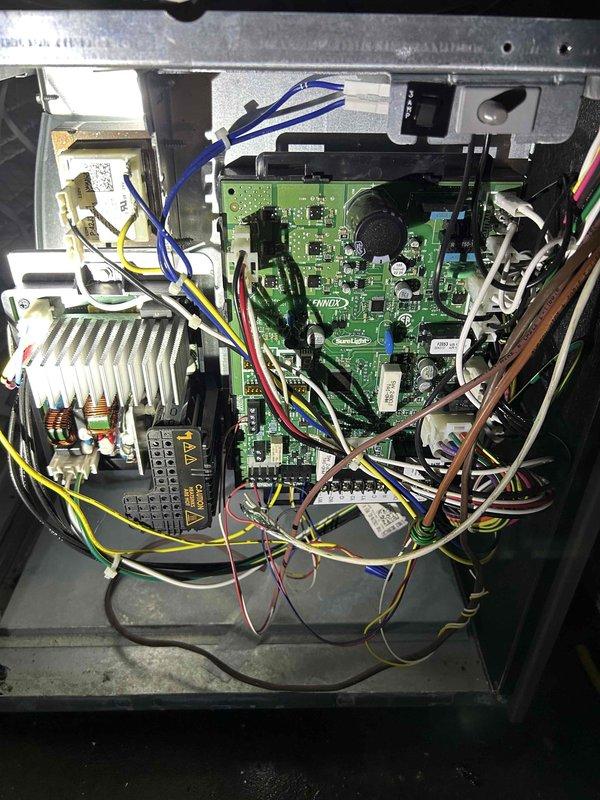 Responded to no cooling complaint on residential HVAC system less than 10 years old. Upon inspection, diagnosed failed blower motor, motor controller, and control board assembly. Documented model and serial number information, photographed defective components including PCB with part number 71.0509/B P:105489-05, and submitted parts order request for blower motor, controller, and control board with estimated 90-minute repair time upon parts arrival.