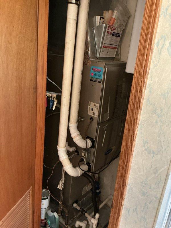 Completed annual planned maintenance on 11-year-old HVAC system located in utility closet. Performed standard maintenance procedures including system inspection, filter replacement with 20x20x1 filters, and operational testing of furnace unit. Delivered additional filters as requested and documented equipment condition with photographs showing unit, PVC ventilation piping, and access panels in satisfactory working order.