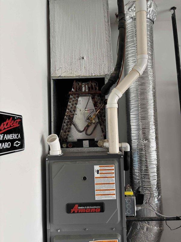 # HVAC Maintenance - Planned Single Maintenance

Completed planned maintenance on 7-year-old Amana residential heating and cooling system. Performed comprehensive inspection of furnace unit, air handler, and associated ductwork, verified proper operation of all mechanical components including blower motor and heat exchanger, checked refrigerant lines and copper coil assembly for leaks or damage, inspected PVC condensate drain lines for proper drainage, examined flexible aluminum ductwork connections and securing straps, replaced 16x25x5 air filter, tested electrical connections and safety controls, and confirmed tankless water heater venting clearances meet manufacturer specifications. System operating within normal parameters with no immediate service needs identified.