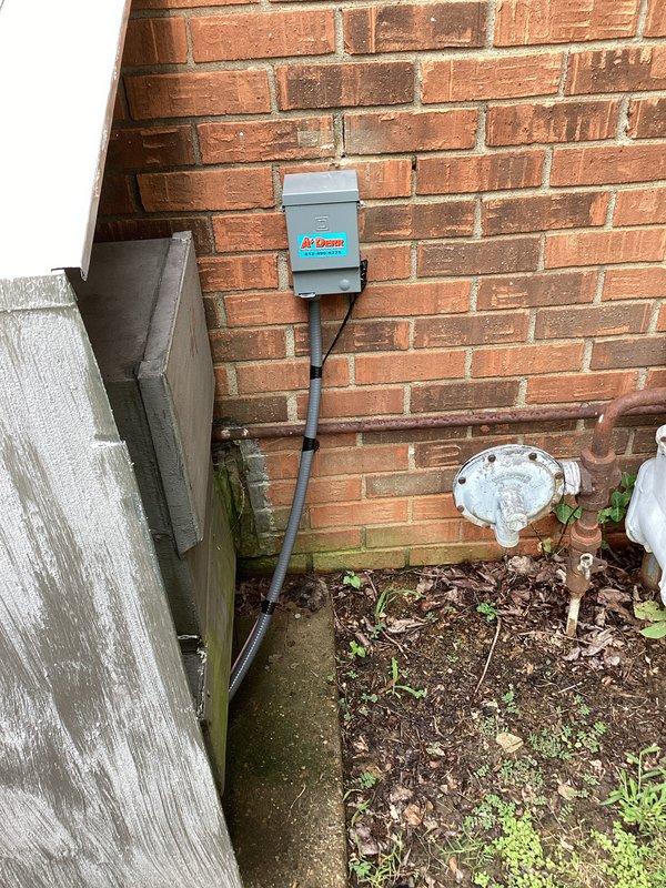 Completed first scheduled maintenance visit on residential HVAC system as part of quarterly service plan. Performed comprehensive system inspection including exterior condenser unit and interior air handler components. Inspected and replaced 20x20x5 air filter to maintain proper airflow and system efficiency. Verified electrical connections, wiring harnesses, and safety disconnects at outdoor unit location. Examined blower motor assembly and internal components for proper operation. Documented equipment condition with photographic records showing exterior condenser unit, electrical disconnect, utility connections, and internal blower assembly with associated wiring. All components found operating within normal parameters with no immediate service needs identified.