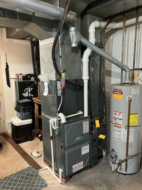 Completed scheduled AC tune-up and maintenance on residential split system with outdoor condensing unit and basement furnace. Performed comprehensive system inspection, verified proper operation of all components, cleaned condenser coils, checked refrigerant levels, and ensured all electrical connections were secure.