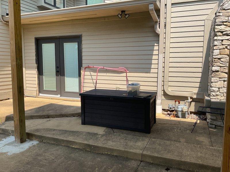 Conducted comprehensive electrical estimate for whole-house generator installation at residential property equipped with 200-amp breaker panel and natural gas service. Evaluated existing electrical infrastructure, documented main breaker panel specifications, and assessed outdoor installation location on rear patio adjacent to French doors for optimal generator placement and utility connections. Provided detailed recommendations for generator sizing, transfer switch installation, and required electrical modifications to integrate standby power system with existing 240V AC service.