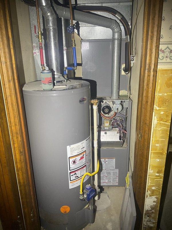 Completed comprehensive HVAC replacement estimate for residential property with existing gas furnace and air conditioning system located in mechanical closet. Evaluated current equipment condition, ductwork configuration, gas line accessibility, and exterior condensing unit placement to provide complete system replacement recommendations for both heating and cooling components.