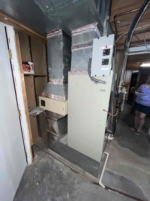 Conducted replacement estimate for 18+ year old HVAC system with non-functional outdoor fan motor due to overheating condition. Evaluated existing basement installation including electrical panel capacity, ductwork configuration, and system accessibility for replacement equipment. Documented current system conditions and provided comprehensive replacement options for aging unit that homeowner has temporarily disabled to prevent further damage.