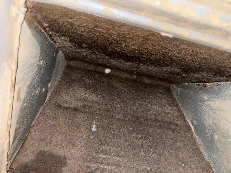 Responded to no cooling complaint on 8-year-old residential HVAC system experiencing repeated evaporator coil freeze-ups despite multiple filter changes. Upon inspection, discovered significant dust and debris accumulation throughout ductwork and air handling system restricting airflow, measured supply air temperature at 158°F indicating inadequate heat exchange. Diagnosed restricted airflow as primary cause of coil icing due to heavily contaminated return air pathway and recommended system cleaning and airflow restoration to resolve freezing issue.