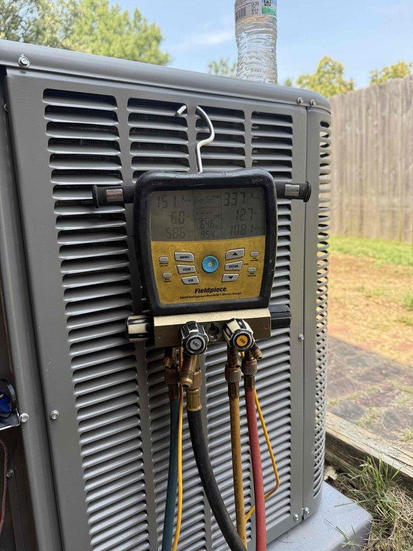 Completed full HVAC system installation featuring a 3-ton Lennox 17 SEER two-stage air conditioning unit paired with a 97% AFUE two-stage downflow gas furnace in the interior mechanical room. Installed outdoor condensing unit with proper refrigerant charging and pressure testing, verified system operation using digital manifold gauges showing optimal temperature and pressure readings. Delivered four 4x10x6 floor supply grills to complete the ductwork distribution system for proper airflow throughout the residence.
