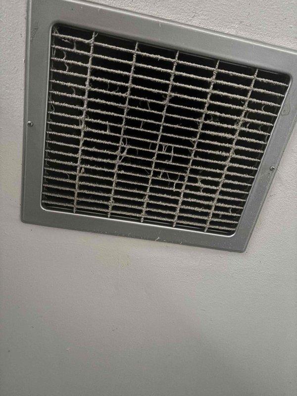Conducted comprehensive replacement estimate for existing HVAC system that failed overnight. Evaluated outdoor condenser unit with weathered cylindrical design and indoor ventilation components showing dust accumulation. Assessed system configuration, ductwork accessibility, electrical infrastructure including exterior conduit box, equipment placement on concrete pad, and overall installation requirements to provide complete replacement options for non-functional heating and cooling system.