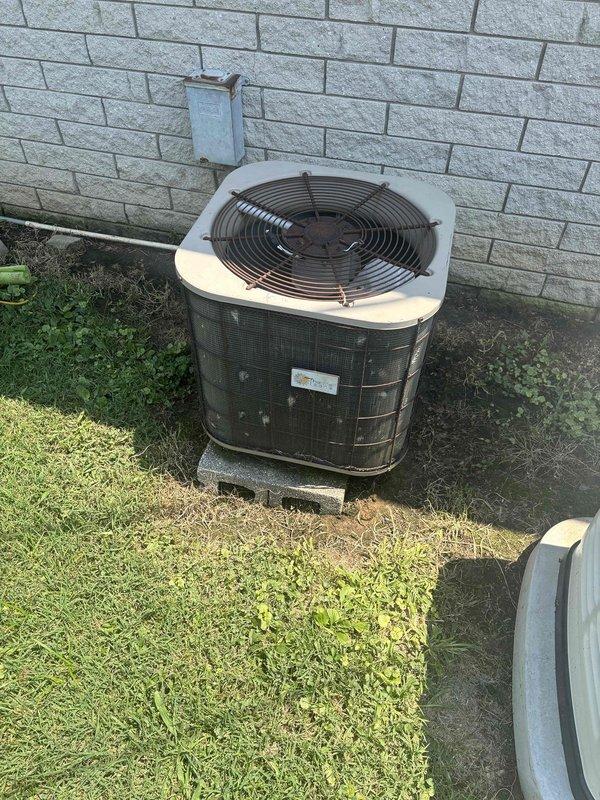 Conducted comprehensive replacement estimate for existing HVAC system that failed overnight. Evaluated outdoor condenser unit with weathered cylindrical design and indoor ventilation components showing dust accumulation. Assessed system configuration, ductwork accessibility, electrical infrastructure including exterior conduit box, equipment placement on concrete pad, and overall installation requirements to provide complete replacement options for non-functional heating and cooling system.