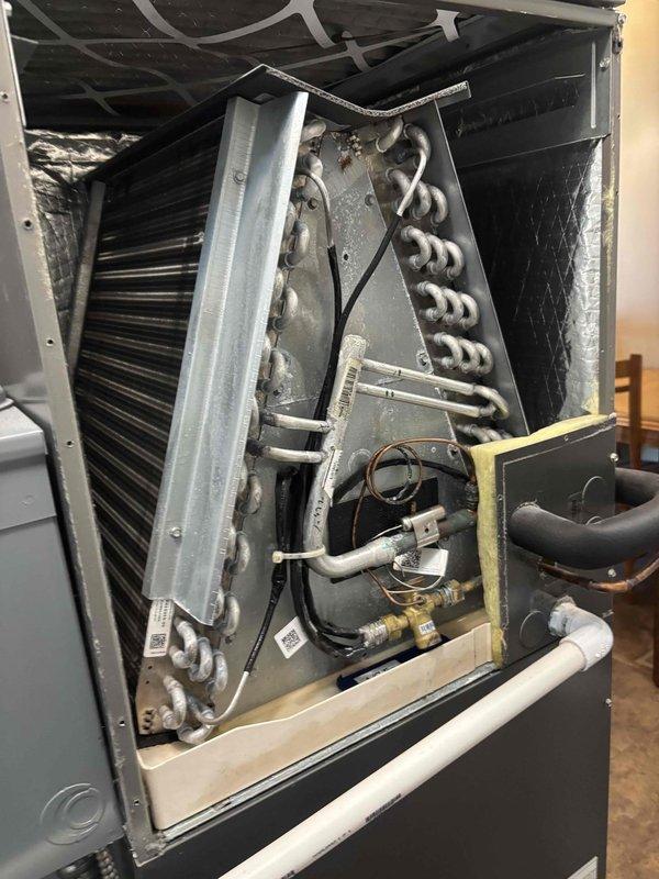 Completed scheduled maintenance tune-up on a 2-year-old Lennox heat pump system currently operating properly. Performed comprehensive inspection of electrical control components including transformer, contactors, relays, and main control board PCB with all connections verified secure. Inspected heat exchanger coil assembly, serpentine refrigerant lines, and evaporator coil noting minor surface discoloration consistent with normal operation; all components functioning within manufacturer specifications with system confirmed operational upon completion.