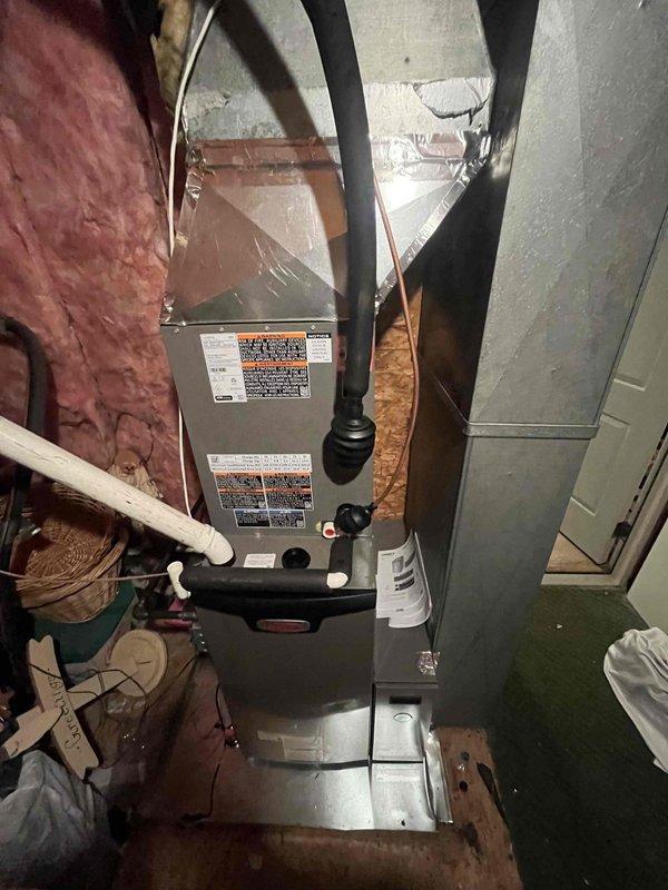 # HVAC Install - Complete System

Successfully completed full system installation of a 2-ton Lennox 18 SEER, 2-stage cooling with 97% AFUE upflow furnace configuration in attic space. Air handler unit mounted on elevated wooden platform with proper clearances and secured to structural framing per manufacturer specifications.

Connected supply and return ductwork using insulated flex duct from air handler discharge, ensuring proper sealing and support throughout attic installation. Installed condensate drain line using PVC piping with appropriate trap and termination point. All ductwork transitions sealed with mastic and secured with code-compliant hangers.

Completed electrical connections for air handler and established proper voltage supply. Wired thermostat control for 2-stage heating and cooling operation. Verified all safety controls, limit switches, and pressure switches functioning correctly.

Performed system startup and commissioning procedures. Conducted operational testing o